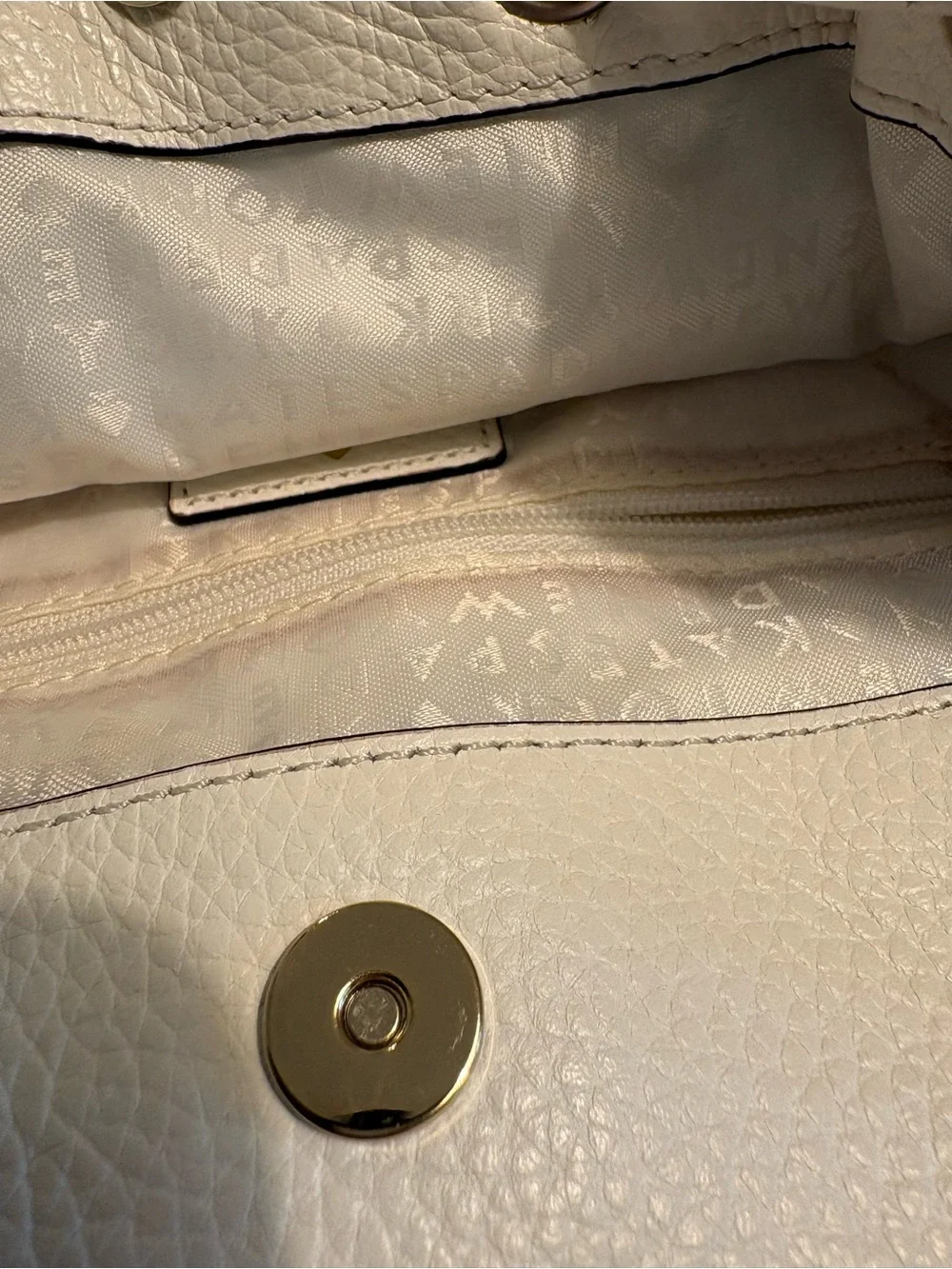 kate spade White Pebbled Leather Drawstring Backpack
